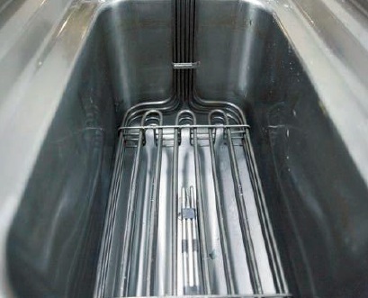 Abb. 6: Lage von Temperaturregler und STB zwischen den Heizspiralen